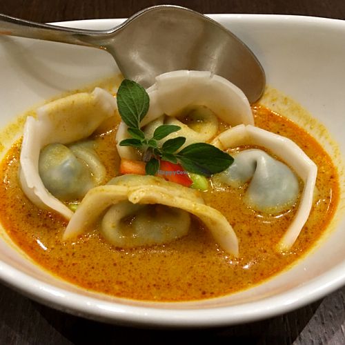 sweet pea ravioli in curry jus w leeks & assorted mushrooms at Herban Fix Vegan Kitchen in Atlanta