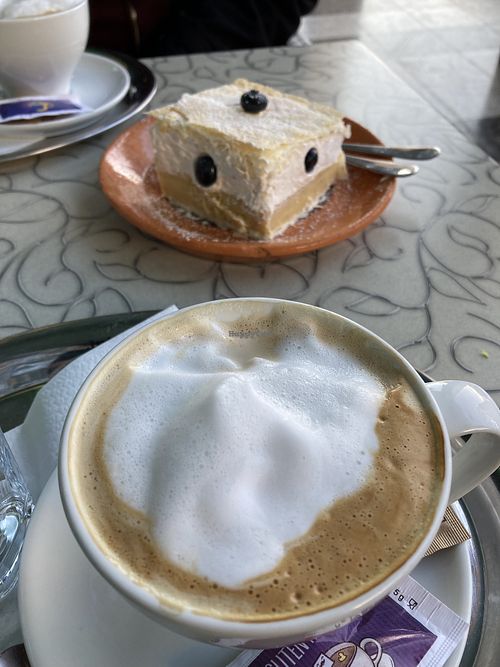 cappuccino and cake at Public Bar & Vegan Kitchen in Bled