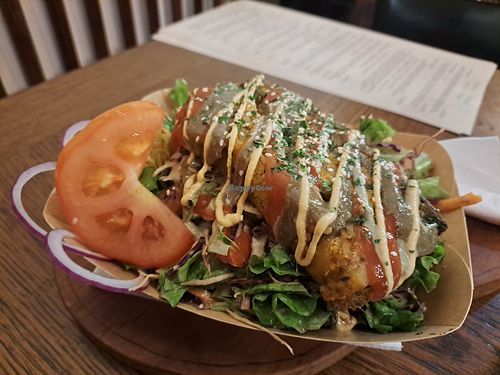 Potato pie on a bed of salad at Public Bar & Vegan Kitchen in Bled