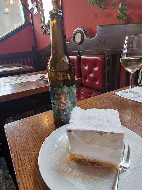 Lake bled cake 5€ and sweet stout beer at Public Bar & Vegan Kitchen in Bled