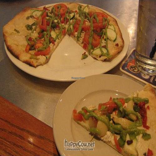 New California veggie pizza feat. avacado puree and roasted garlic.  This particular pizza is made w/ Vegan Gourmet cheese. at Brixx Wood Fired Pizza - Uptown in Charlotte