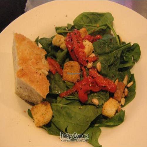 The spinach salad w/o the dressing or cheese.  The pine nuts and roasted peppers make this to die for! at Brixx Wood Fired Pizza - Uptown in Charlotte