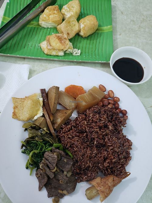 My plate, plus fried tofu served after I sat (was a surprise) at Tu Hao in Hanoi