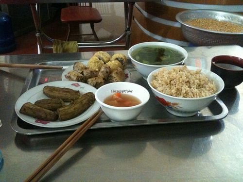 Our delicious meal and shared rice and soup. 55.000 VND, enough to feed two people  at Chua Due Tu in Hanoi