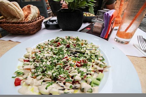 aubergine with hummus and tahini sauce at Aubergine in Bucharest