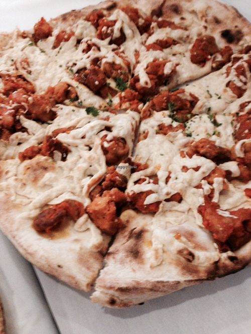 Buffalo Seitan Pizza at 3 Brothers Vegan Cafe in Copiague