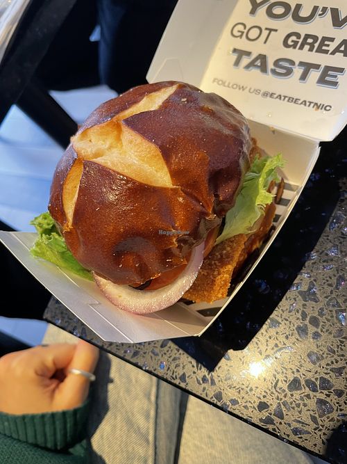 Crispy tempeh chicken with pretzel bun at Beatnic - Bleecker St in New York City