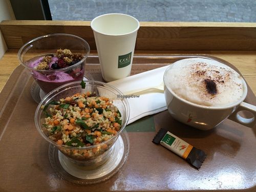 A curry and bulgur salad, muesli with a kind of yogurt, and cappuccino. at EXKi - Montorgueil in Paris