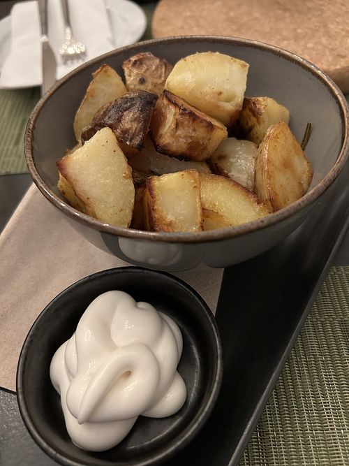 Rosemary & garlic potatoes with mayo  at NovaPizza Vegan Kitchen in Edinburgh