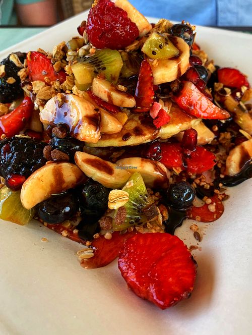 Pancake stack with fresh fruit at Feliz Cafe in Peschiera Del Garda