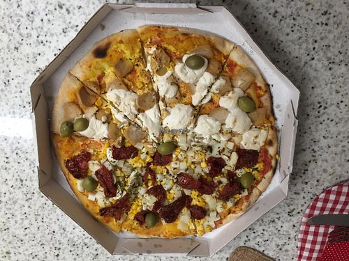 Pizza from the delivery service. at Bella Mooca Pizzaria in Sao Paulo