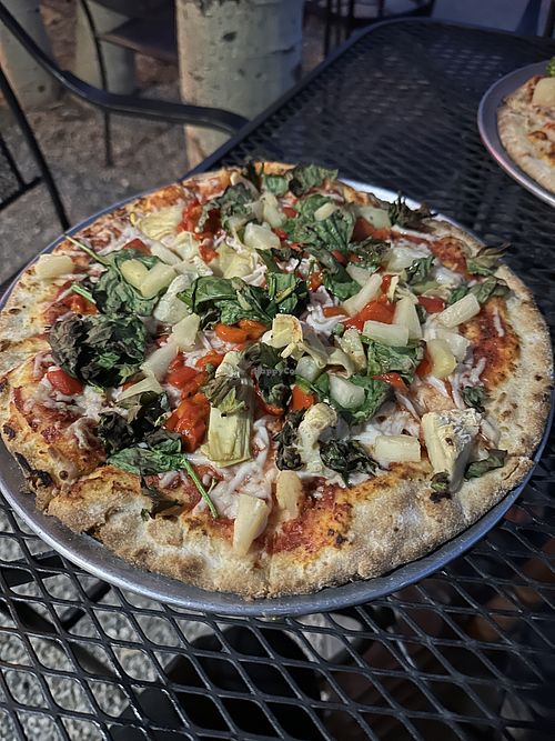 Mediterranean, pizza with vegan cheese on a gluten-free crust, added pineapple  at Last Chance Pizza Company in Dillon