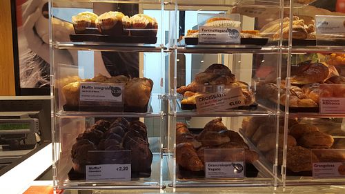 vegan carrot cake at the top, vegan apricot croissant at the bottom at Moka Bar and Snack in Rome