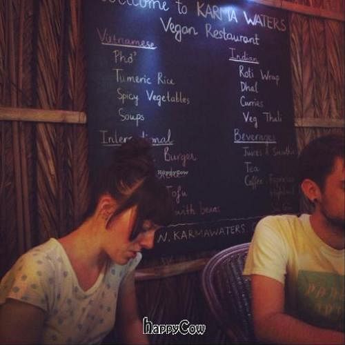 blackboard with menu items at Karma Waters in Hoi An