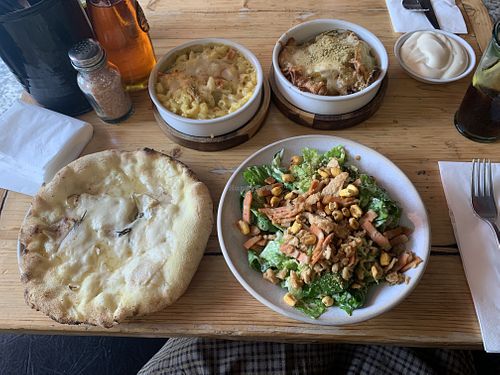All GF - Mac & Cheese, potatoes, Caesar salad & garlic flatbread   at Purezza in Brighton