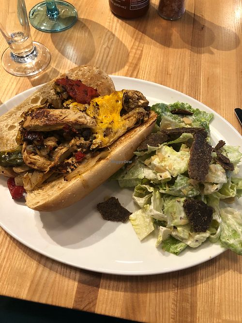 Philly cheese steak with Caesar salad.  at Cider Press Pub in St Petersburg