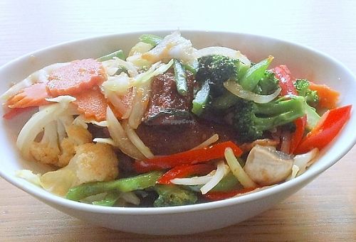 Vegan mock meat vegetables with steamed rice at Veggo Sizzle in Adelaide