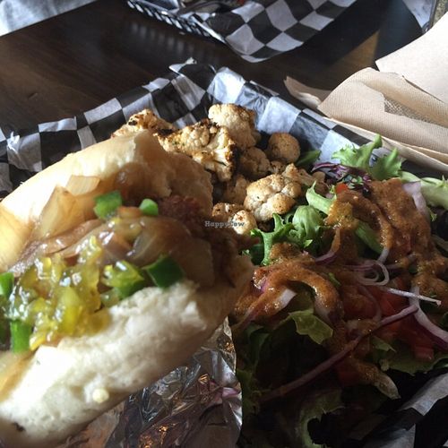 Vegan herb dog w/ grilled onions & jalapenos  at Biker Jim's in Highlands Ranch