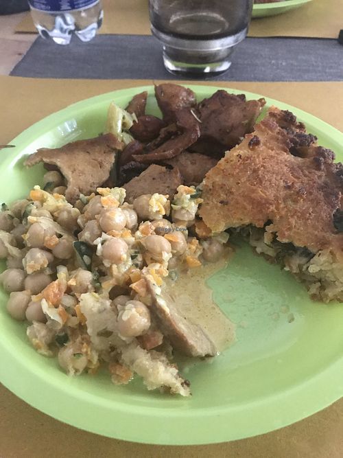 Seitan and broccoli stir fry, spinach and potato pie, chickpea salad. at Zenzero in Lecce