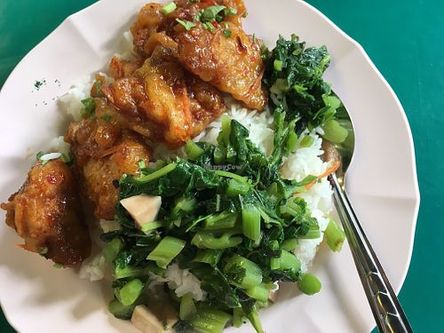 Fried sweet and sour mushrooms and sautéed greens with rice at Lumpini Park Morning Market Stall in Bangkok