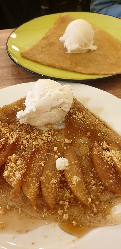 Apple crepe on the foreground with lemon and sugar crepe in the background at Rue de Creperie in Fitzroy