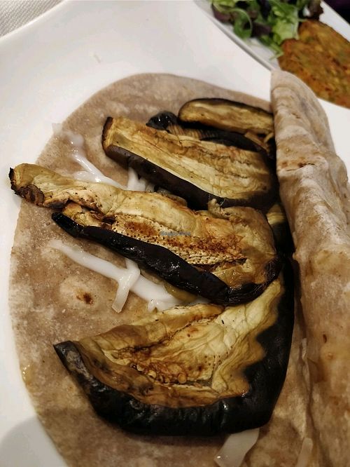 Piadina vegana - vegan cheese, eggplant, tomatoes and capers  at Caffe & Caffe in Como