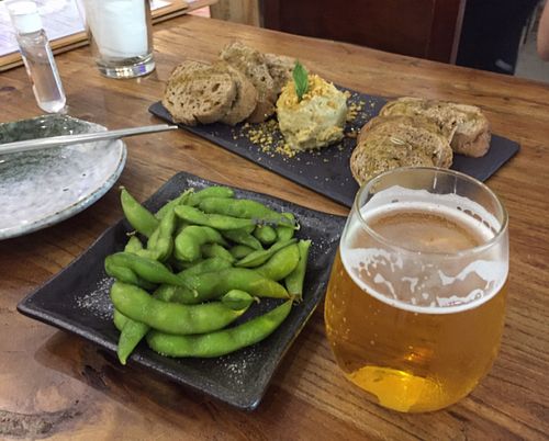 Edamame, hummus, frosty beer at Casa Tapas in New Territories