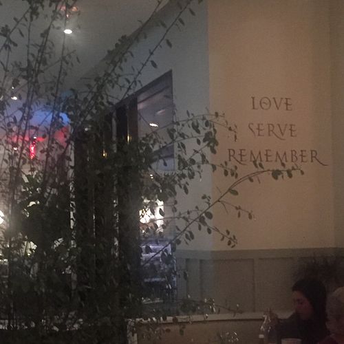 Love Serve Remember wall at Cafe Gratitude in San Diego
