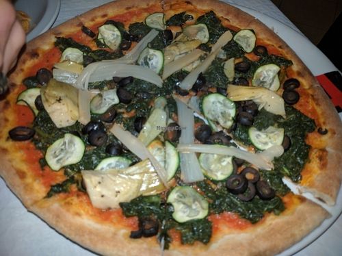 veg pizza with no mozzarella  at L'Oasis Italiana in Armacao De Pera