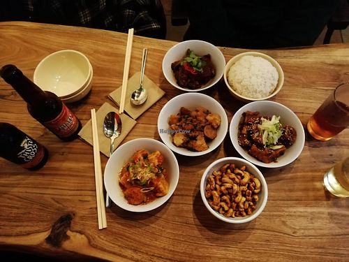Drinks and small bowls - nuts, tofu, tempeh dishes at The Hug and Pint in Glasgow