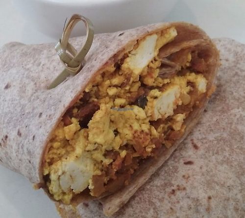 Vegan tofu scramble wrap with soyrizo, pasilla chili and a side of ansazi beans for brunch. at True Food Kitchen in Houston