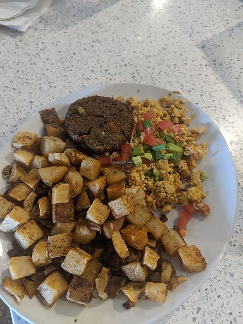 Potatoes, tofu scramble, and vegan/gf sausage at Kerbey Lane Cafe in Round Rock