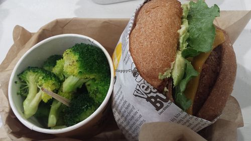 Super delicious burger w/side of broccoli!! at VeganBurg in San Francisco