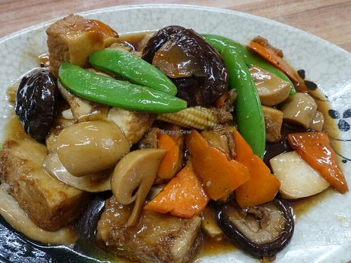stirred fried bean curd with mushrooms at New Realm 素林 in Central Singapore
