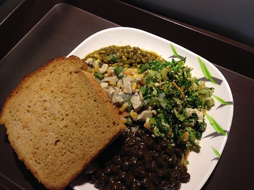 Daily Bread veg and bean selections, with fresh carrot bread, on top of rice at The Daily Bread in Bangkok