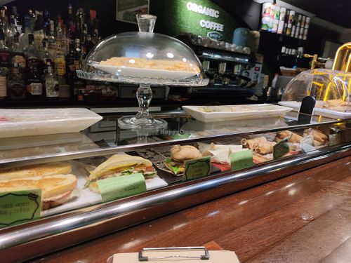 Pinxtos bar! The items with the green signs are vegan. at Crock and cock in Bilbao