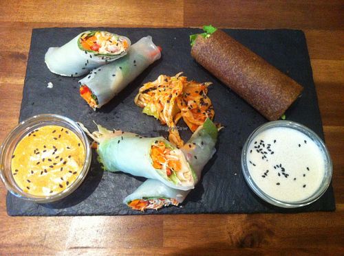 Power Rolls and Rawtastic Wrap with spicy almond sauce and creamy saue and a serving of kimchi at Rawtastic in Berlin