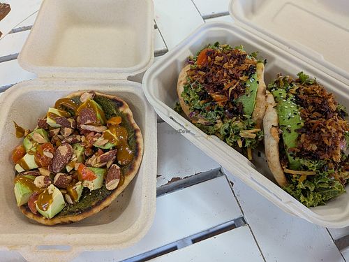 Kale avocado tacos and pizza with balsamic drizzle at Leahi Health - Kaimuki in Honolulu