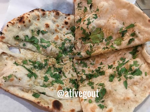 garlic naan  at Fusion of Flavors in Mobile