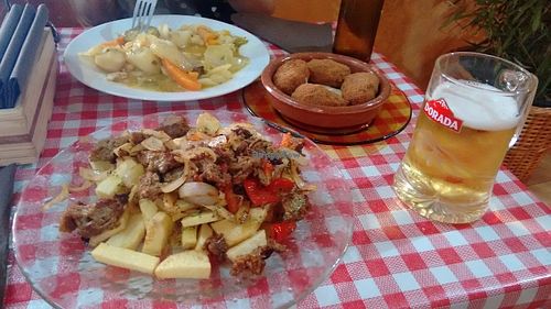 Gf got a stew, I had chips with seitan. Delicious side order of croquettes! at Somos Lo Que Comemos in Tenerife