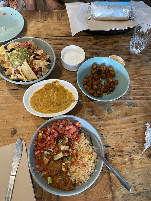 Half eaten cauli (so good!), nachos and jackfruit burrito bowl  at Bay City Burrito in St Kilda