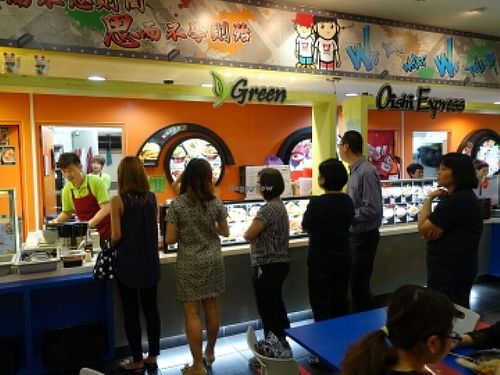 lunch time queue in front of stall at vGreen in Central Singapore