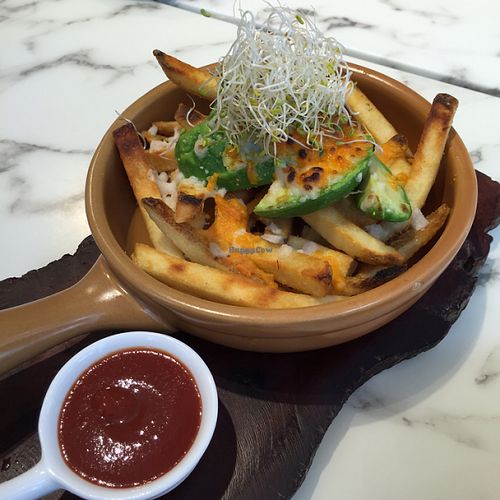 Potato fries with avocado and vegan cheese at OVOCafe - Central in Hong Kong Island