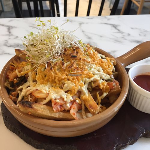 Fire on fries (potato fries with kimchi, avocado and vegan cheese) at OVOCafe - Central in Hong Kong Island