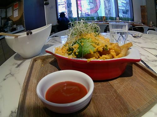 Chips with avocado and vegan cheese at OVOCafe - Central in Hong Kong Island