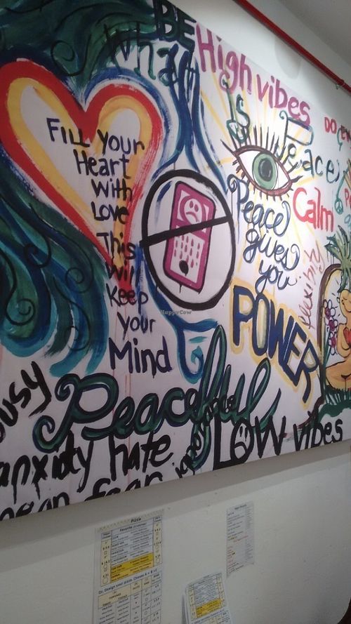 As I take a photo at Peace Cafe in Central Singapore