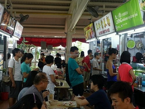 long queue in front of stall.  at Living Wholesome 生活天然健康素食 - Bukit Timah in Central Singapore