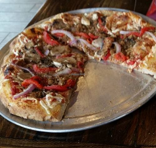 Rosemary Garlic Crust
Spicy Red Sauce
Vegan Cheese
Vegan Crumbles
mushrooms
marinated mushrooms
onions 
roasted red peppers =
YUM!!!!  at Piaza Fresh in Berlin
