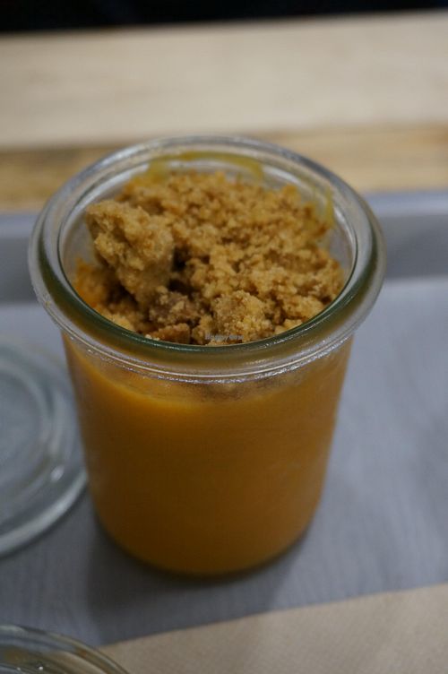 Crème légère au citron-patate douce & crumble coco. at Le Veganovore in Paris