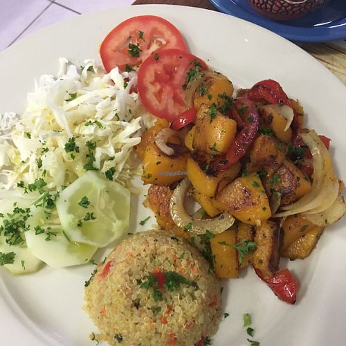 sautéed pumpkin with quinoa, cabbage & veggies  at Green Food Service in Oranjestad